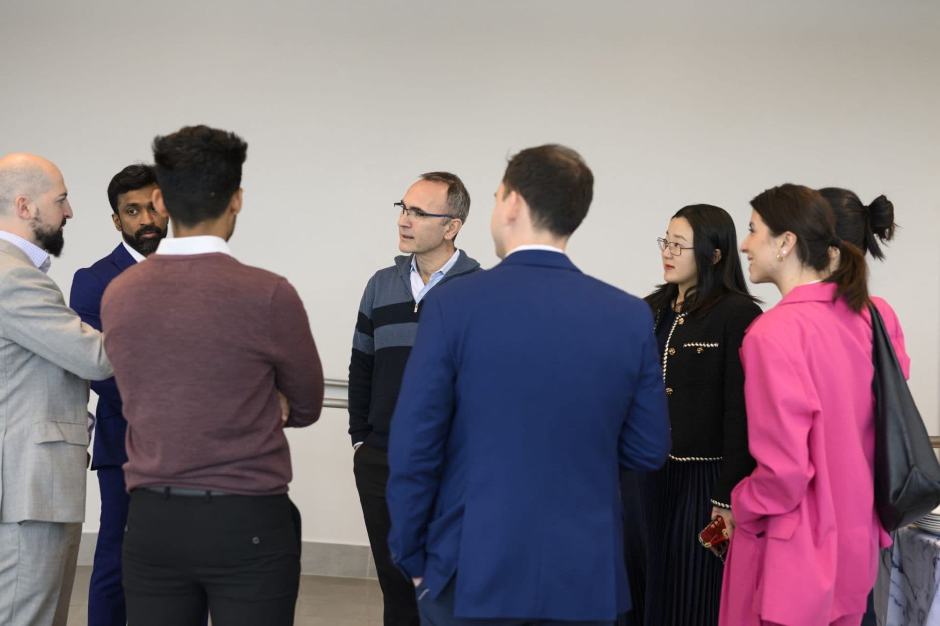 IFC team members networking and discussing AI innovations